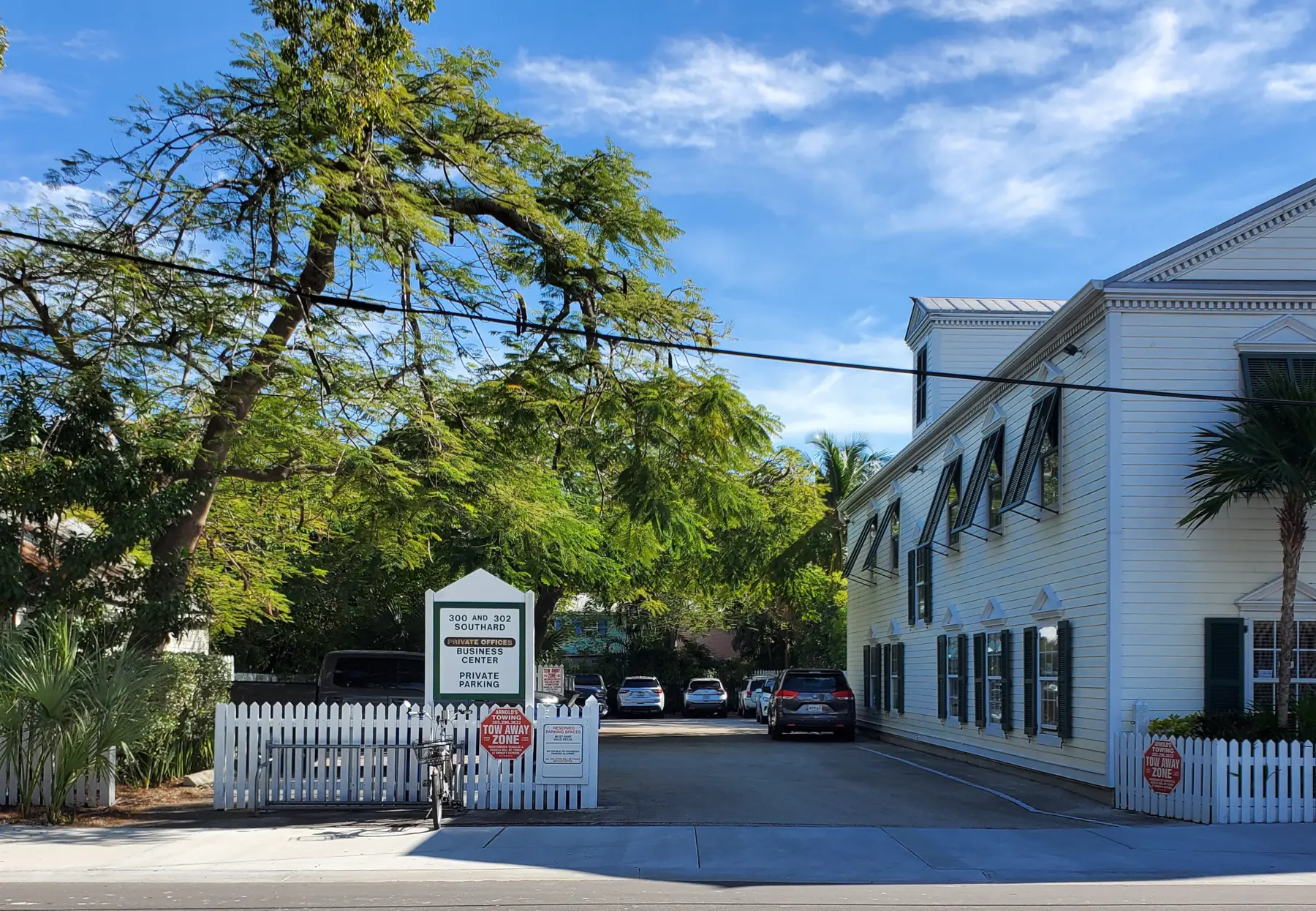 Parking entrance and property sign